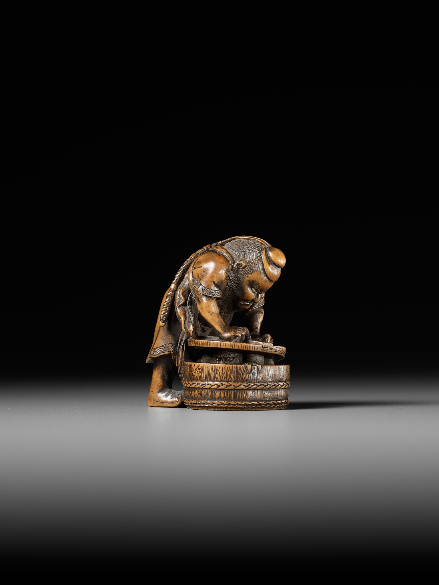 Artwork by Hokyudo Itsumin, HOKYUDO ITSUMIN: A FINE NETSUKE-OKIMONO OF SHOKI AND ONI, Made of translucent horn