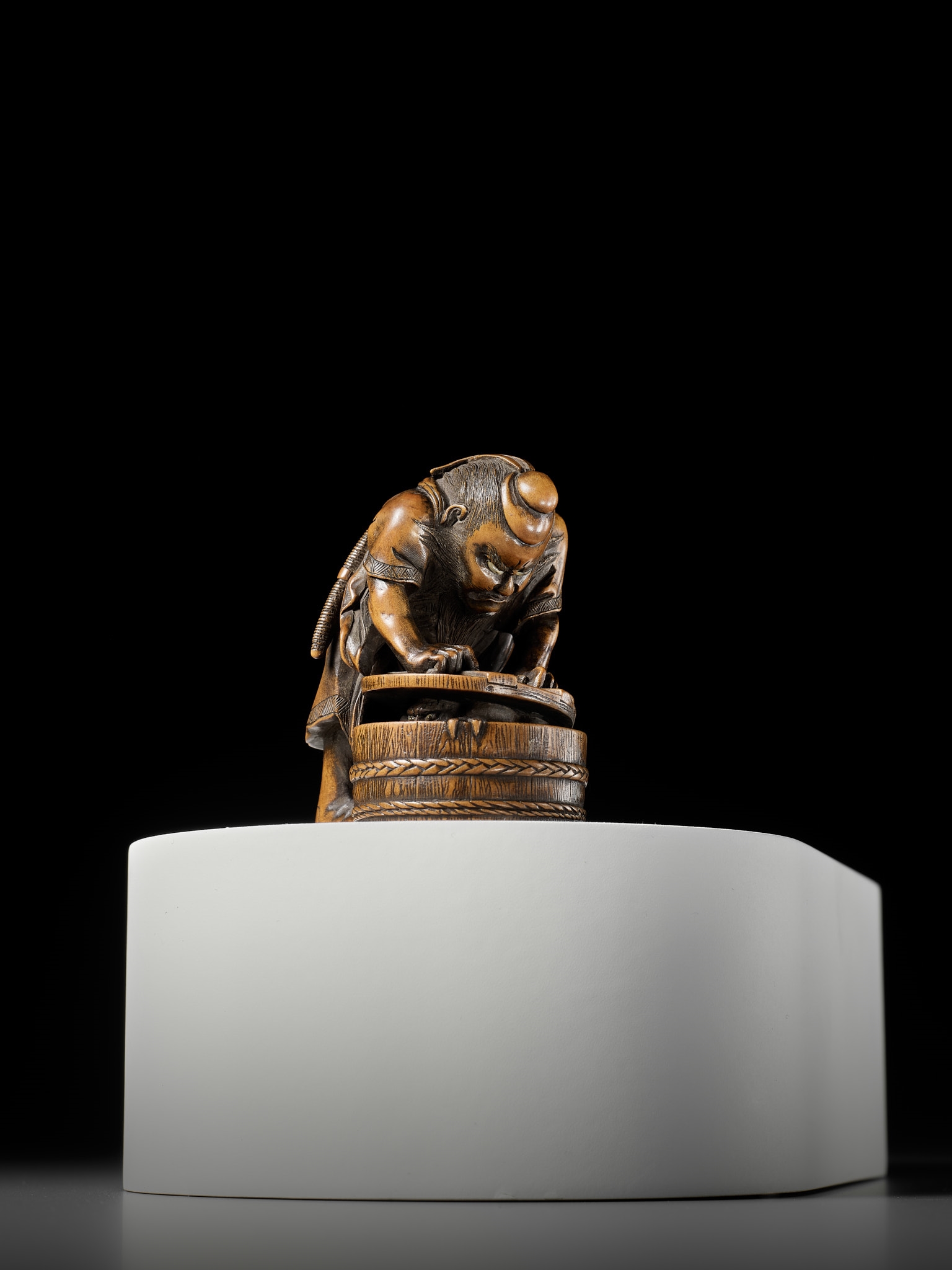 Artwork by Hokyudo Itsumin, HOKYUDO ITSUMIN: A FINE NETSUKE-OKIMONO OF SHOKI AND ONI, Made of translucent horn