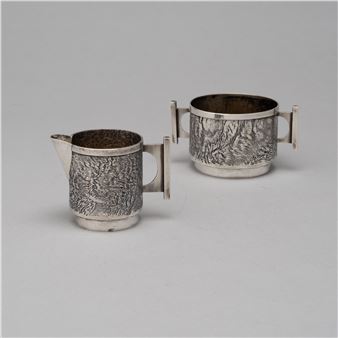 A sugar bowl and a cream jug - Pekka Turunen