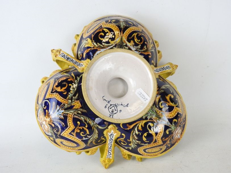 Artwork by Ulysse Besnard, Polychrome earthenware three-lobed pedestal bowl decorated with arabesques, fauns and a central cartouche featuring a Renaissance man, Made of Polychrome earthenware