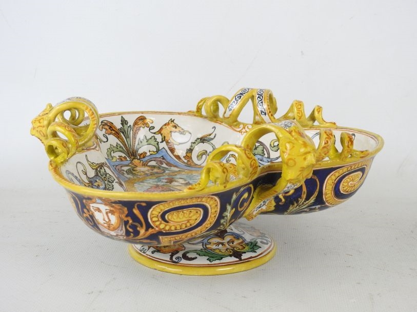 Artwork by Ulysse Besnard, Polychrome earthenware three-lobed pedestal bowl decorated with arabesques, fauns and a central cartouche featuring a Renaissance man, Made of Polychrome earthenware