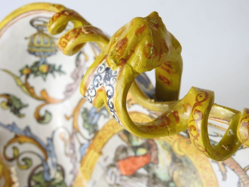 Artwork by Ulysse Besnard, Polychrome earthenware three-lobed pedestal bowl decorated with arabesques, fauns and a central cartouche featuring a Renaissance man, Made of Polychrome earthenware