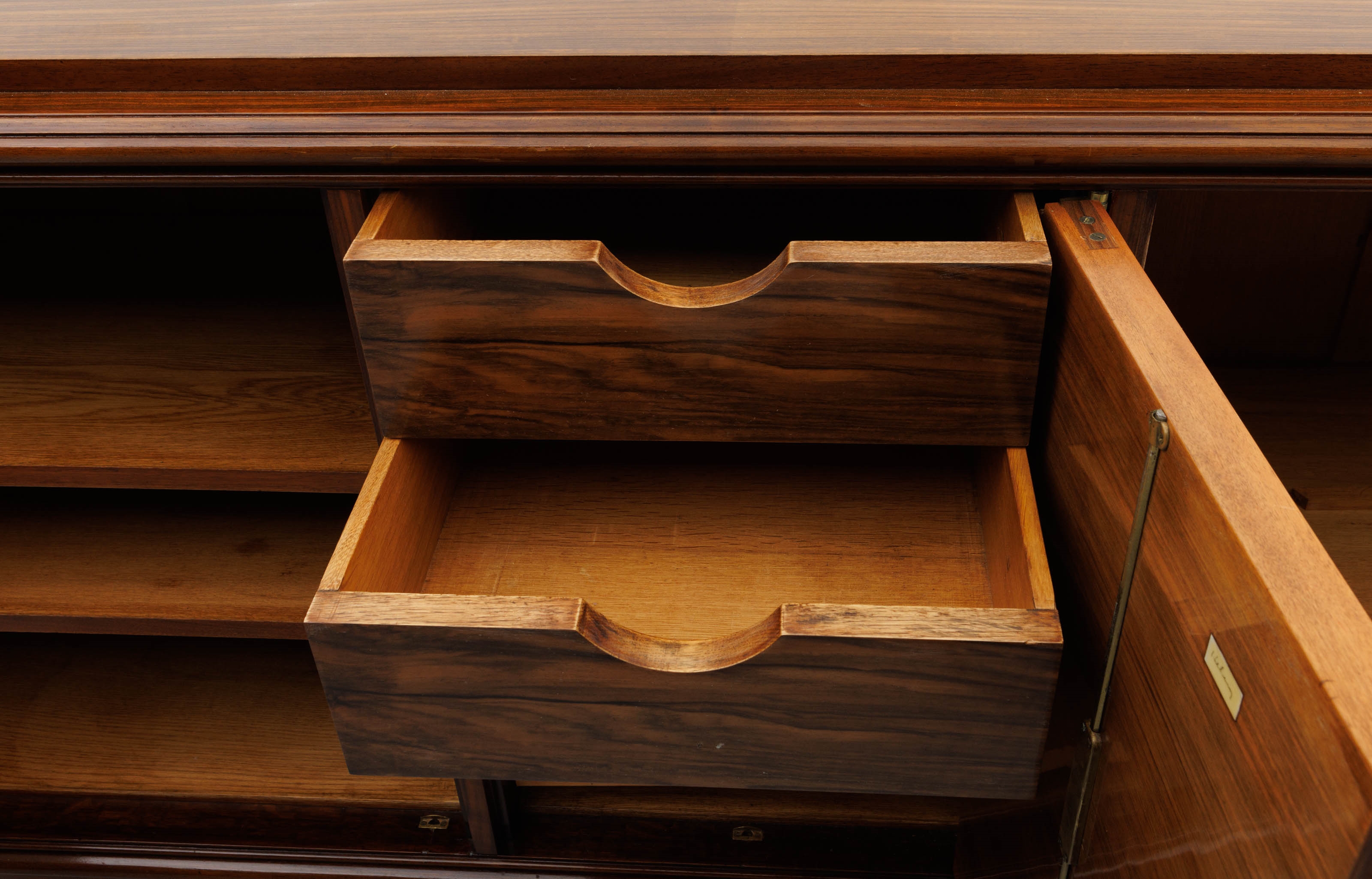 Artwork by Jules Leleu, An Art Deco-period polished rosewood sideboard, Made of polished rosewood