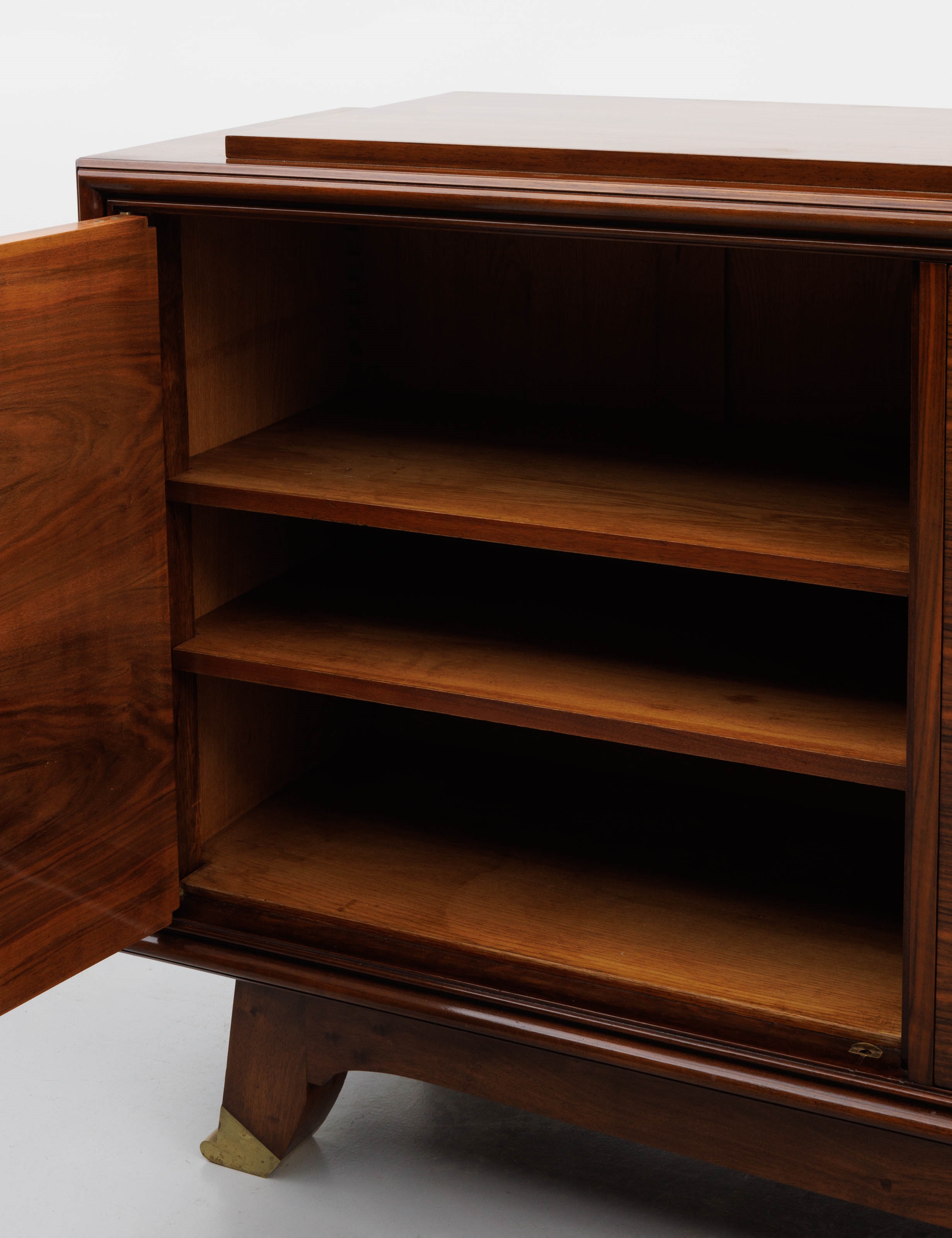 Artwork by Jules Leleu, An Art Deco-period polished rosewood sideboard, Made of polished rosewood