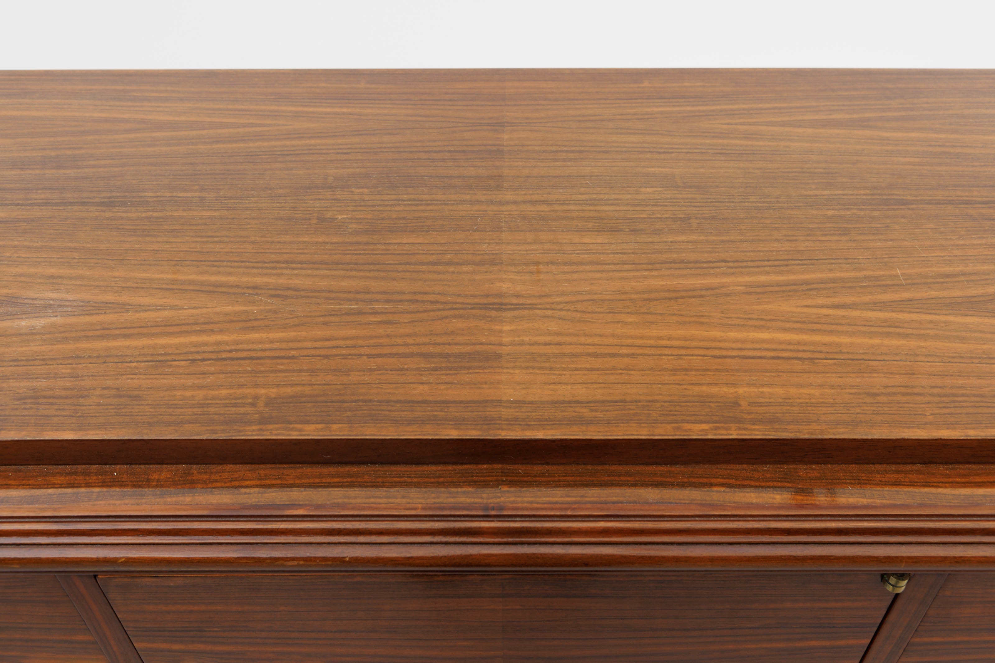 Artwork by Jules Leleu, An Art Deco-period polished rosewood sideboard, Made of polished rosewood