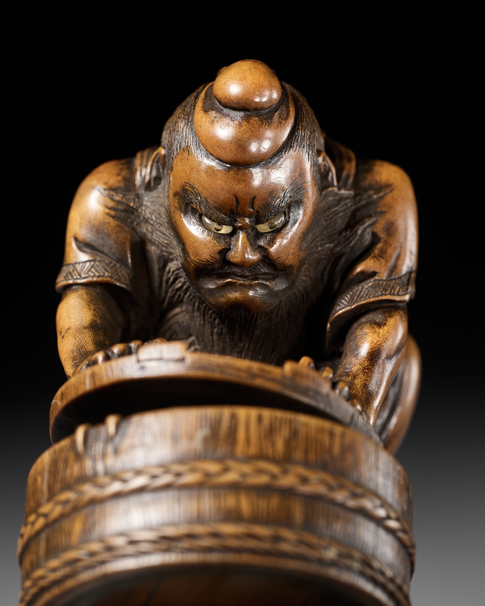 Artwork by Hokyudo Itsumin, HOKYUDO ITSUMIN: A FINE NETSUKE-OKIMONO OF SHOKI AND ONI, Made of translucent horn