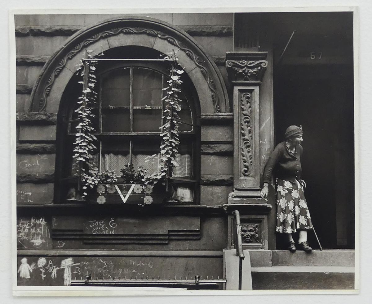 Walter Rosenblum | Woman in Doorway, 105th ST, NYC (1952) | MutualArt