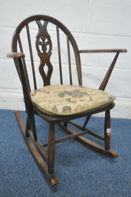 Lucian Ercolani | A MID CENTURY FLEUR DE LIS CHILDS ROCKING CHAIR ...