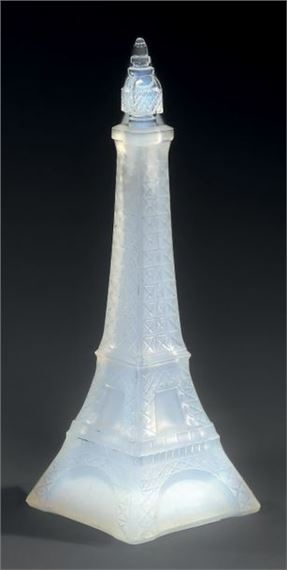 Marius Ernest Sabino | FLACON SHAPING THE SHAPE OF THE EIFFEL TOWER Frosted  glass. Signed under the base. c. 1920. Height. 21 cm; Width. 7.5 cm; Depth.  7.5 cm. Very slight accident under one foot | MutualArt