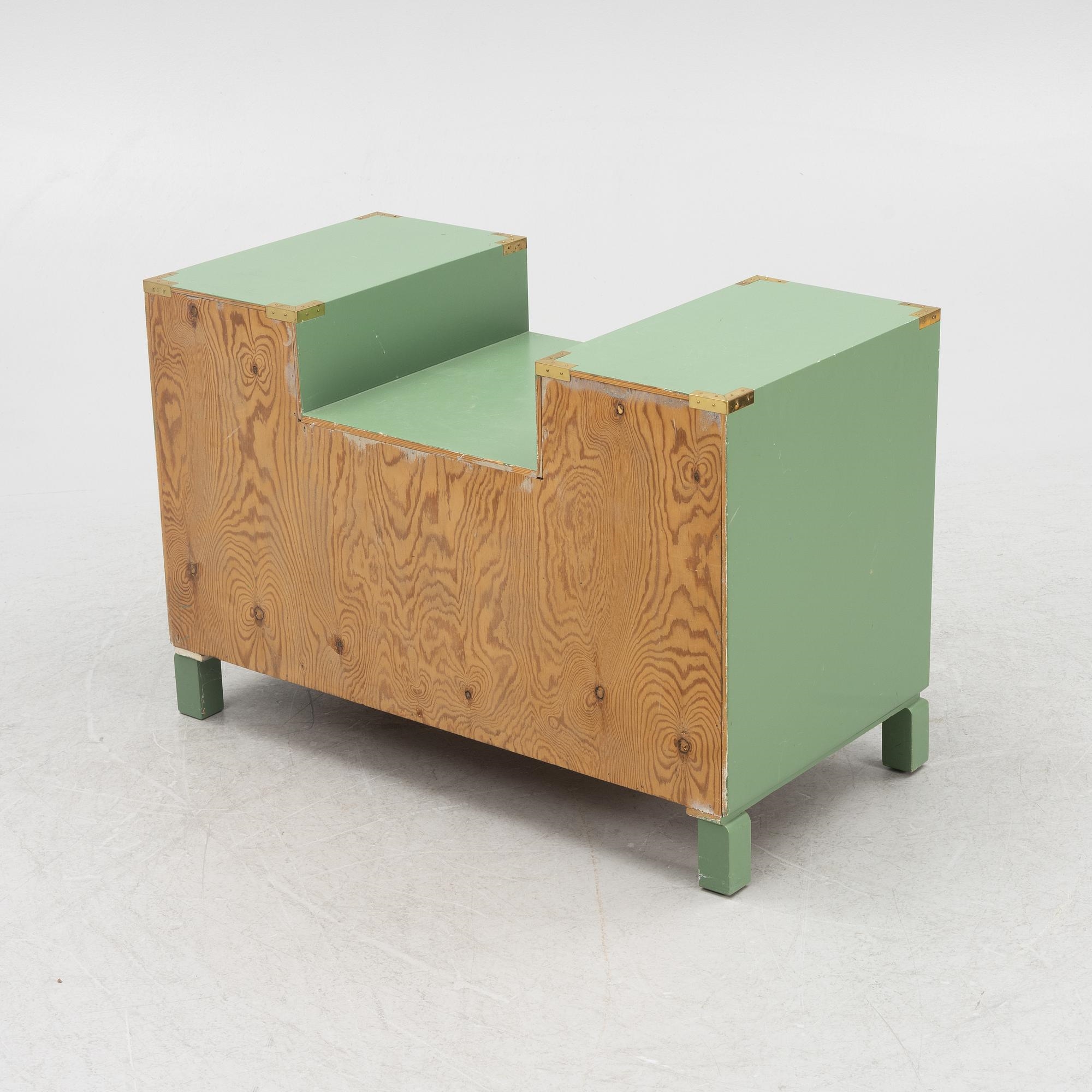 Artwork by Ove Feuk, Ove Feuk, a chest of drawers, Nordiska Kompaniet 1970s, Made of green lacquered with brass fittings