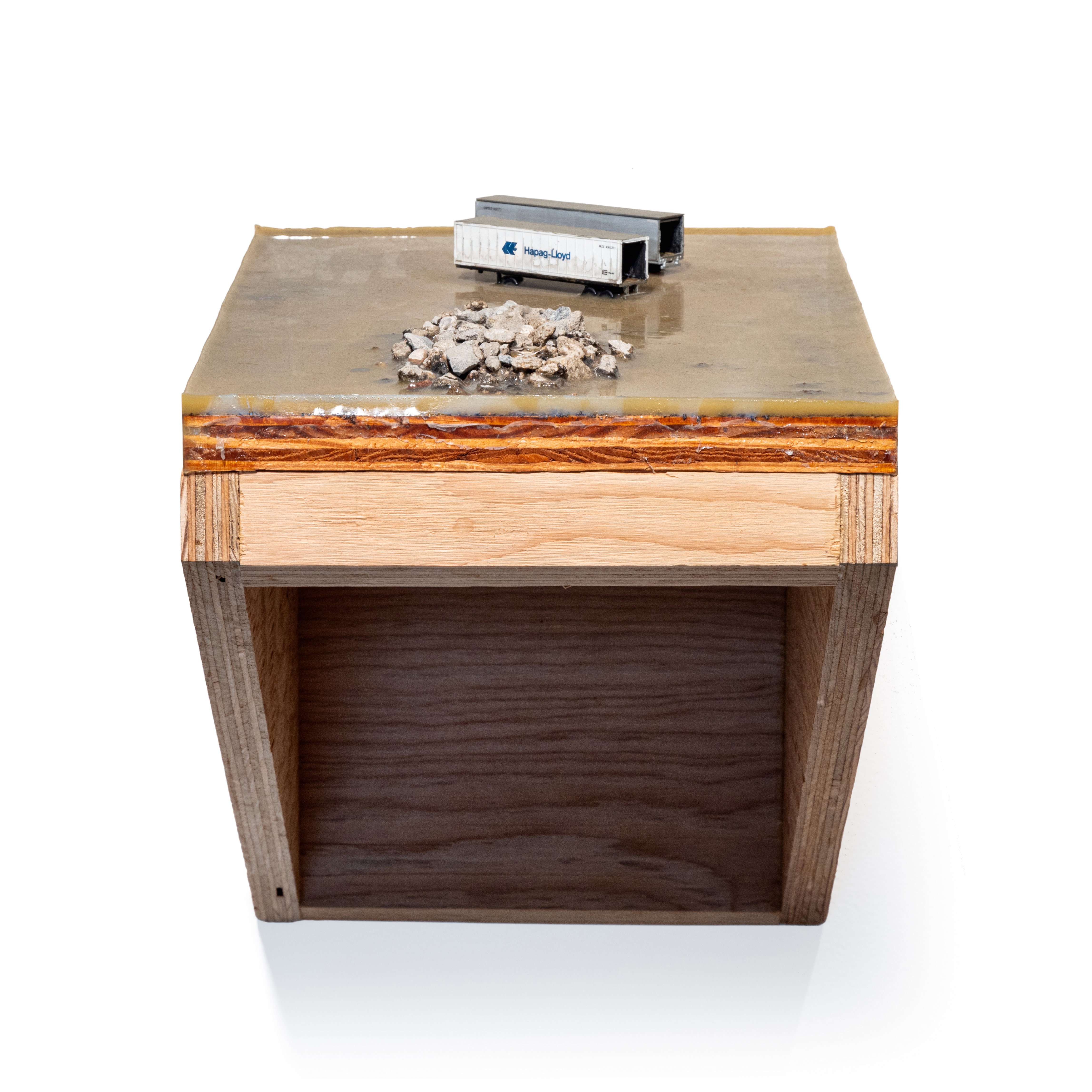 Artwork by Michael Ashkin, No. 30, Made of wood, dirt, rocks, epoxy resin
