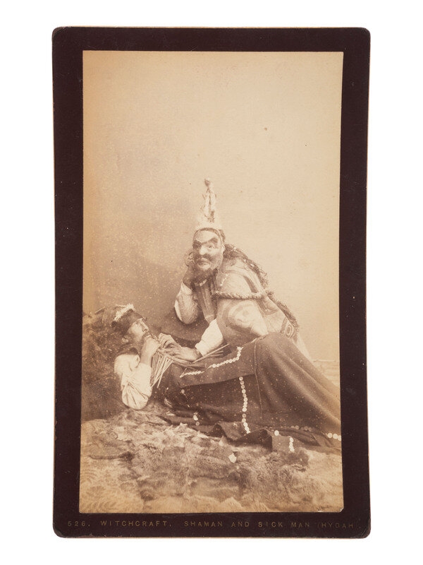 Artwork by Edward de Groff, NATIVE AMERICANS] DE GROFF, Edward, photog. 2 boudoir cards of a Haida shaman. Sitka, AK, ca 1890, Made of mount