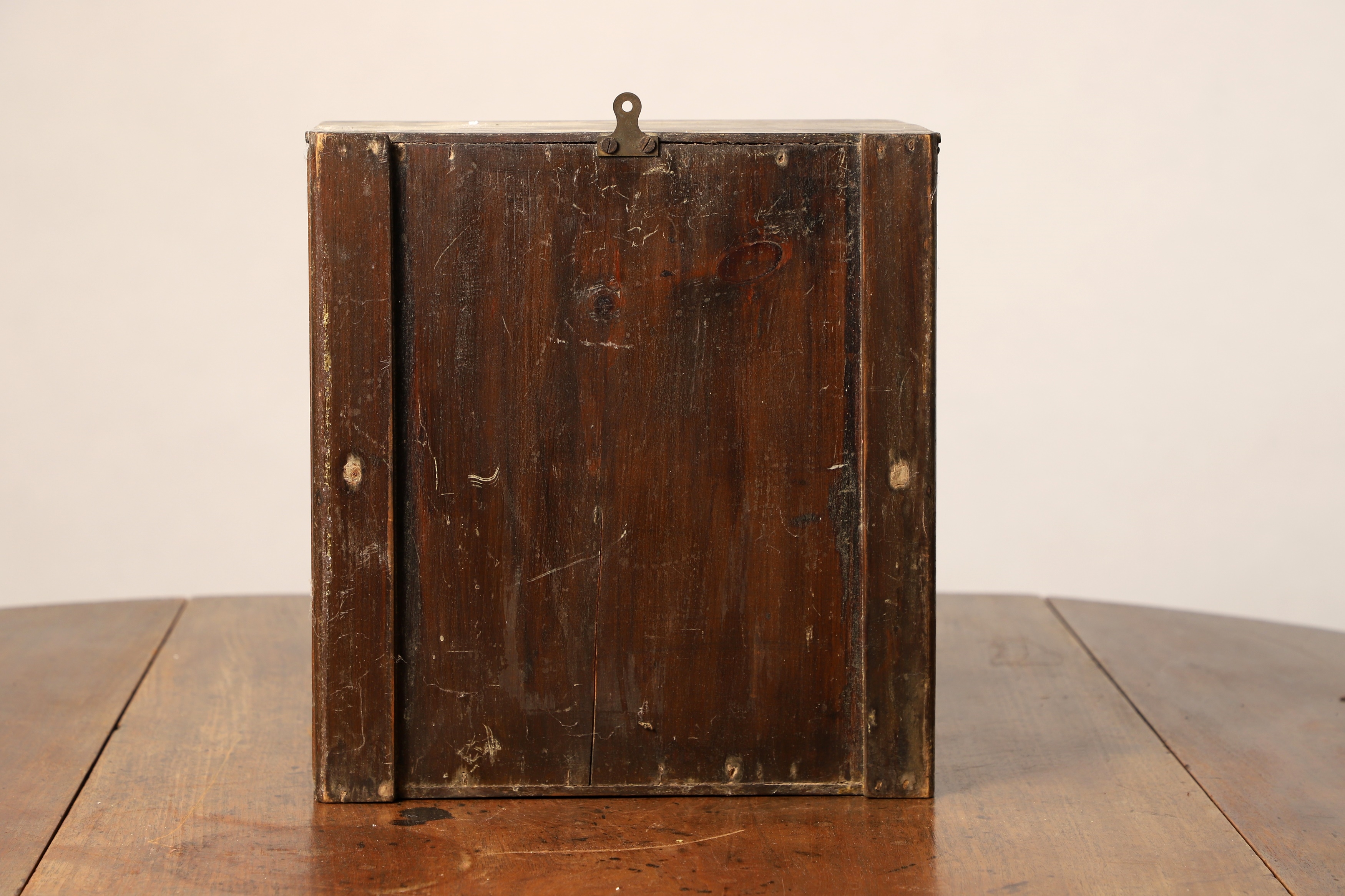 Artwork by Joseph Plackett, in a naturalistic setting with a painted back