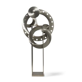 A metallic sculpture featuring interlocking rings and a central disc mounted on a rectangular base.