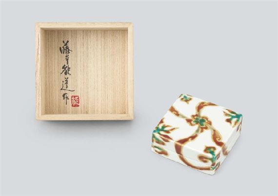 Square small box with design of arabesque in greenish white glaze and overglaze enamel by Yoshimichi Fujimoto