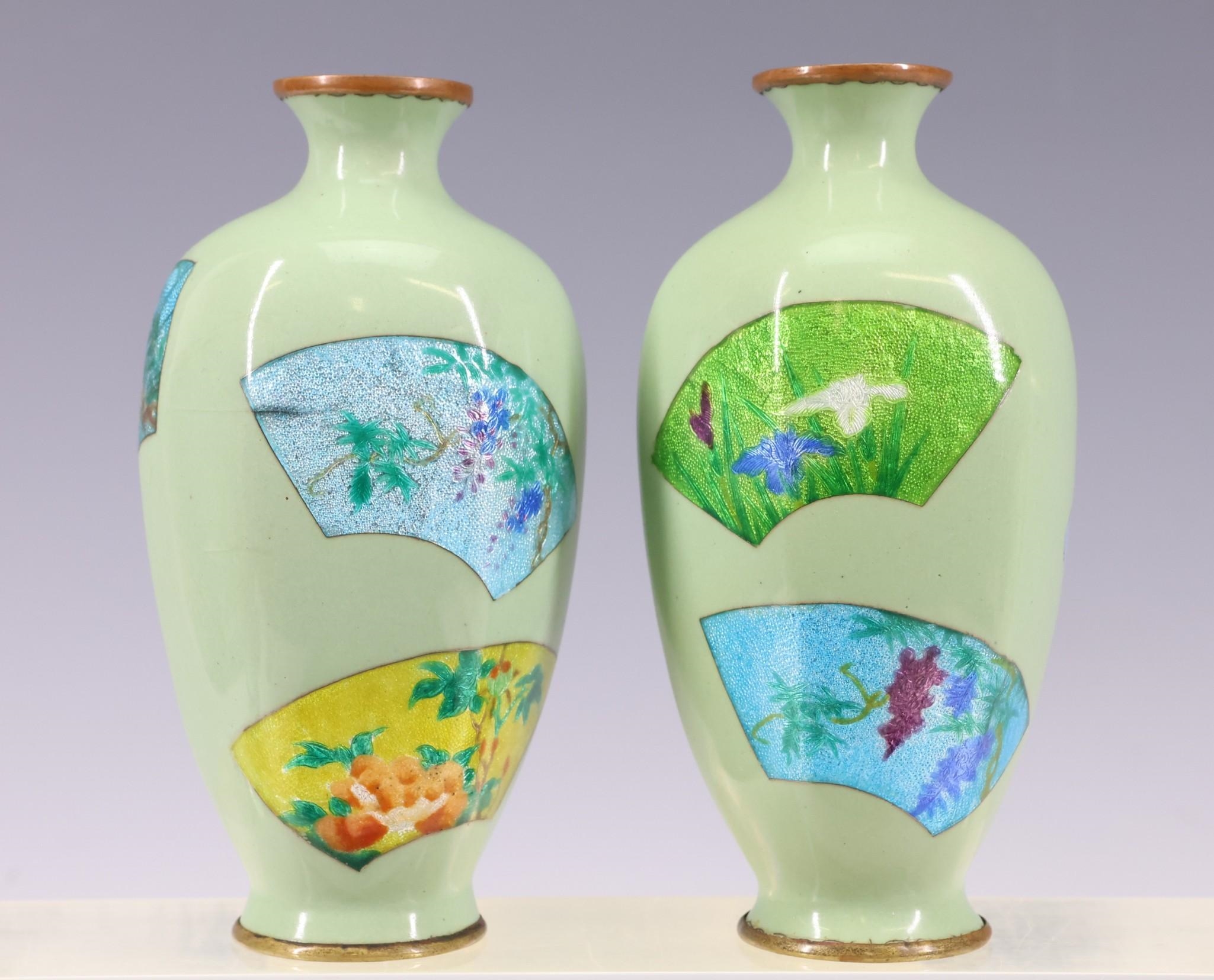 Artwork by Gonda Hirosuke, Late Meiji - Showa era pair of scalloped tsuiki-jippo cloisonne vases with fan form panels decorated with textured florals, Made of fan