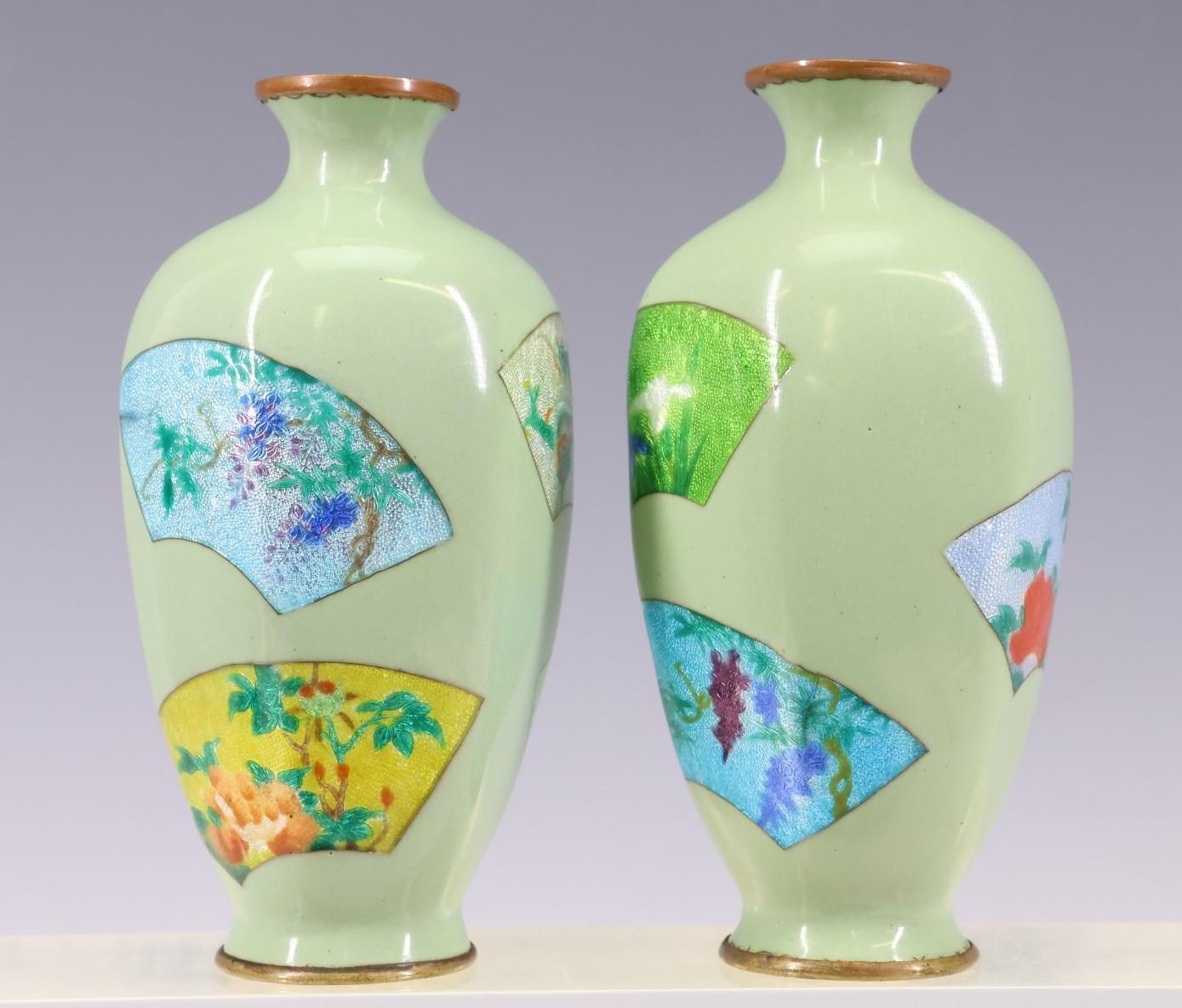 Artwork by Gonda Hirosuke, Late Meiji - Showa era pair of scalloped tsuiki-jippo cloisonne vases with fan form panels decorated with textured florals, Made of fan
