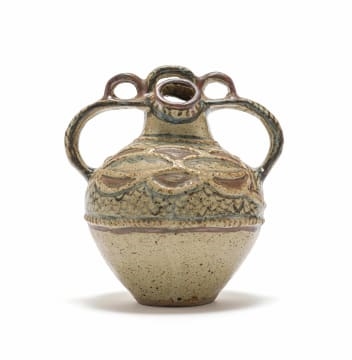 Artwork by Lephina Molefe, Double-spouted vessel with decorative handle and relief decoration, Made of relief decoration
