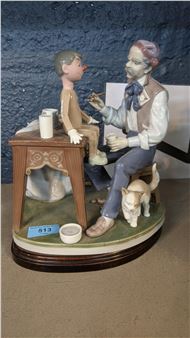 A Lladro porcelain figure group of The Puppet Painter (Pinocchio) designed by Salvatore Furiosse - Salvatore Furiosse