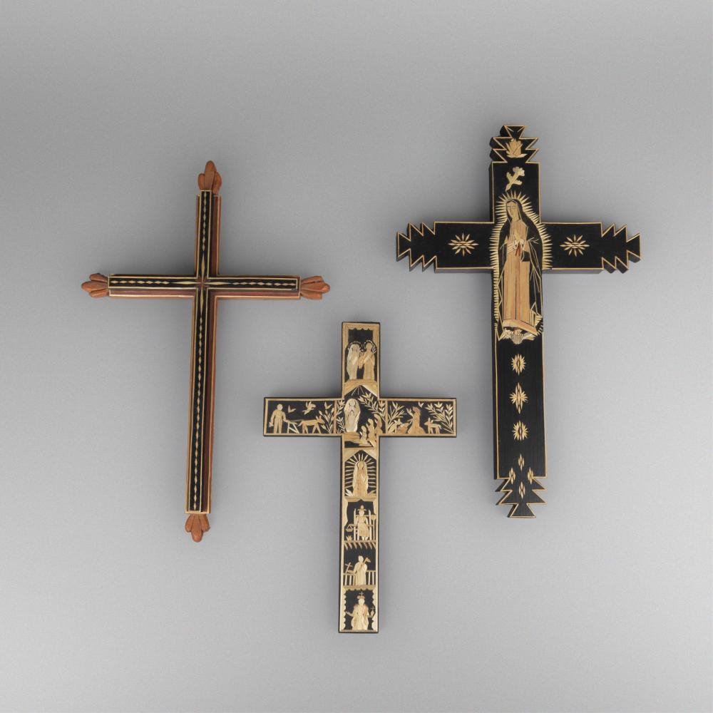 Artwork by Paula Rodriguez, Charlie Sanchez, Diana Moya-Lujan, Charlie Sanchez + Diana Moya Lujan + Paula Rodriguez, Group of Three Straw Appliqué Crosses, Made of carved wood