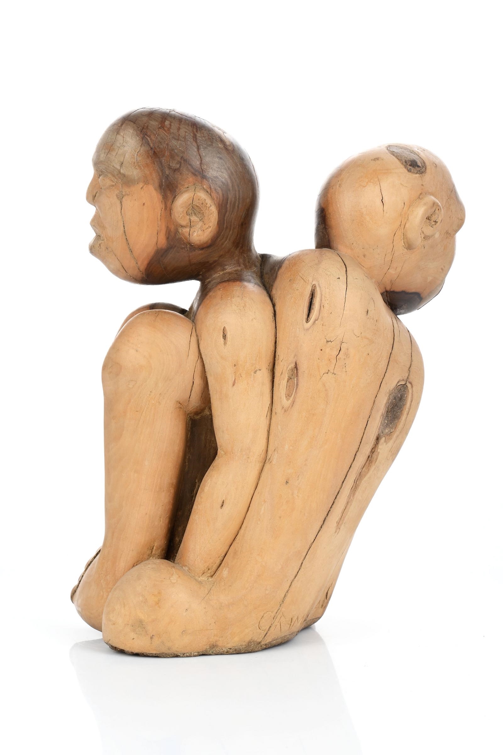Artwork by George Ramagaga, Entwined Figures, Made of carved wood