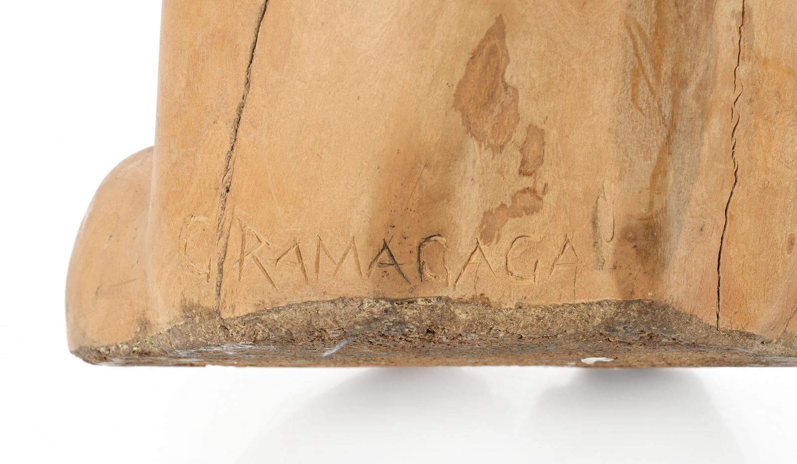 Artwork by George Ramagaga, Entwined Figures, Made of carved wood