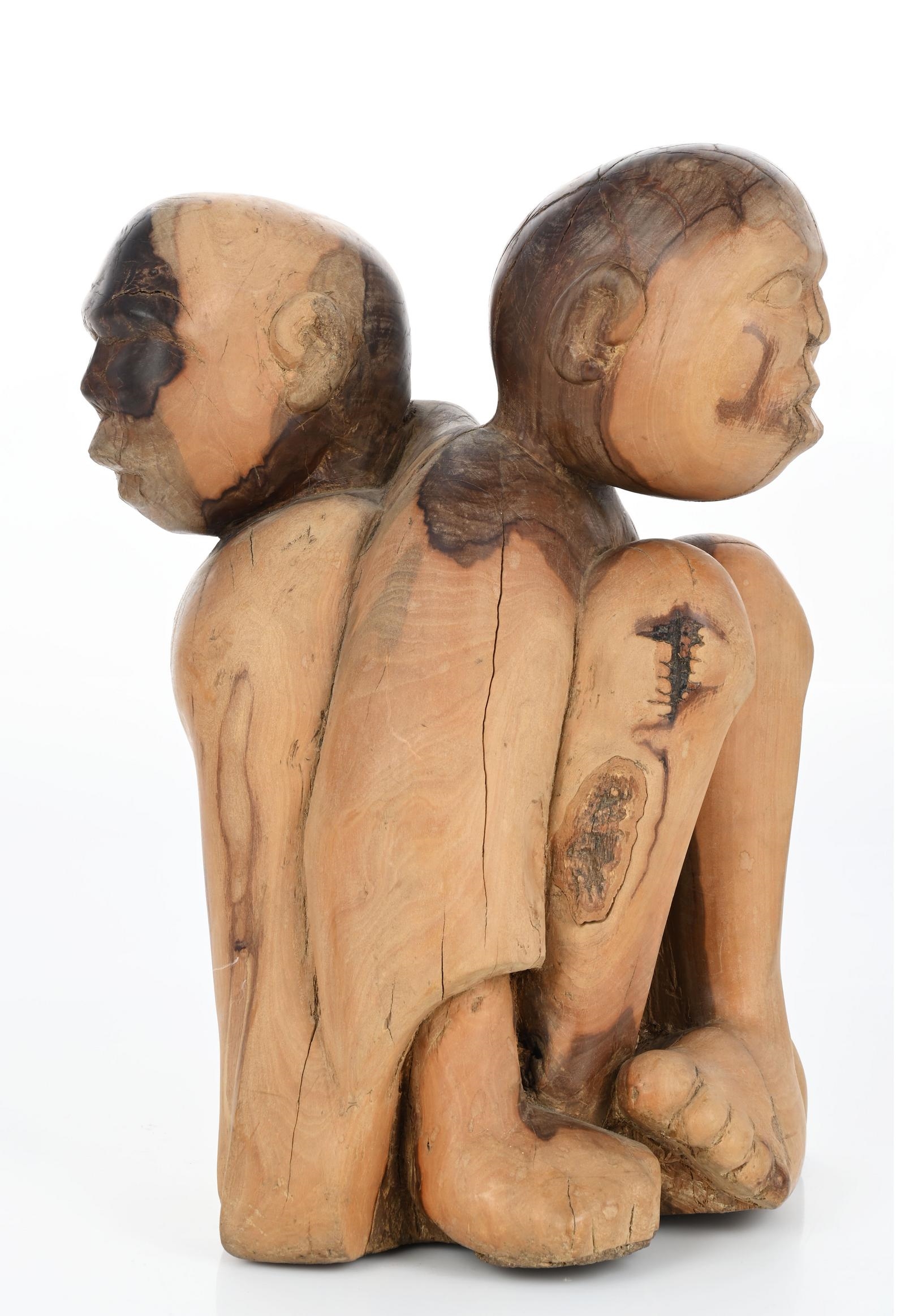 Artwork by George Ramagaga, Entwined Figures, Made of carved wood