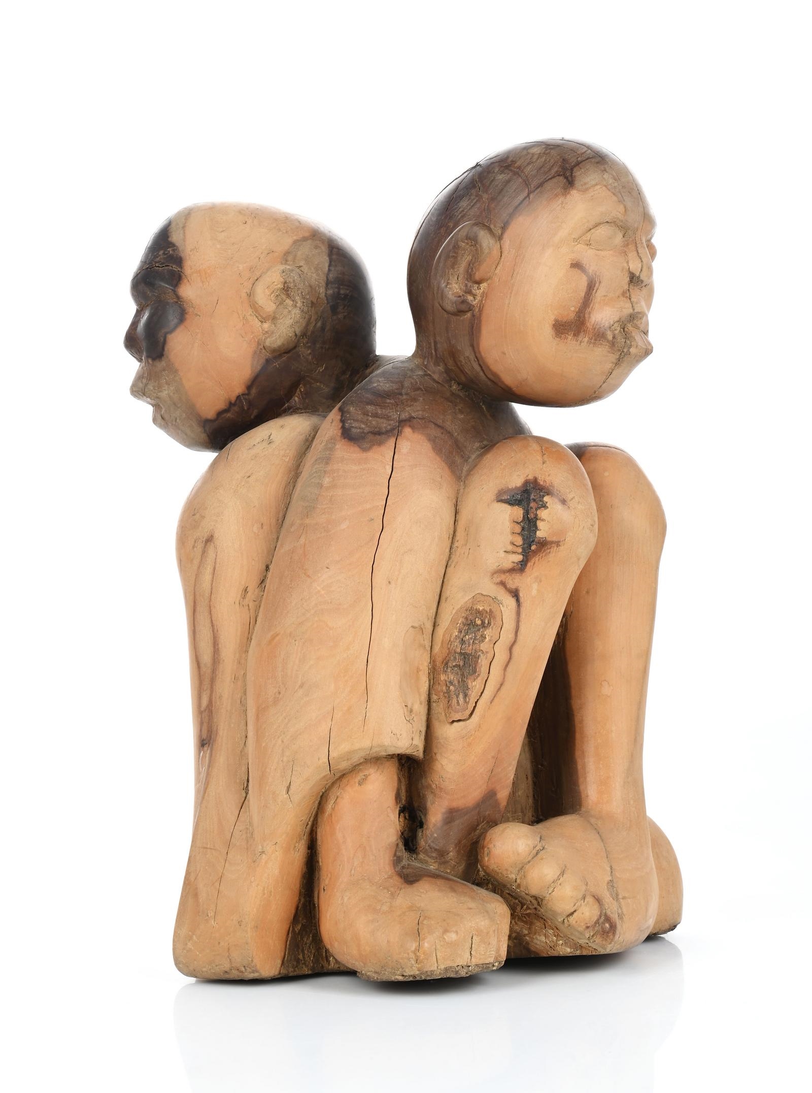 Artwork by George Ramagaga, Entwined Figures, Made of carved wood