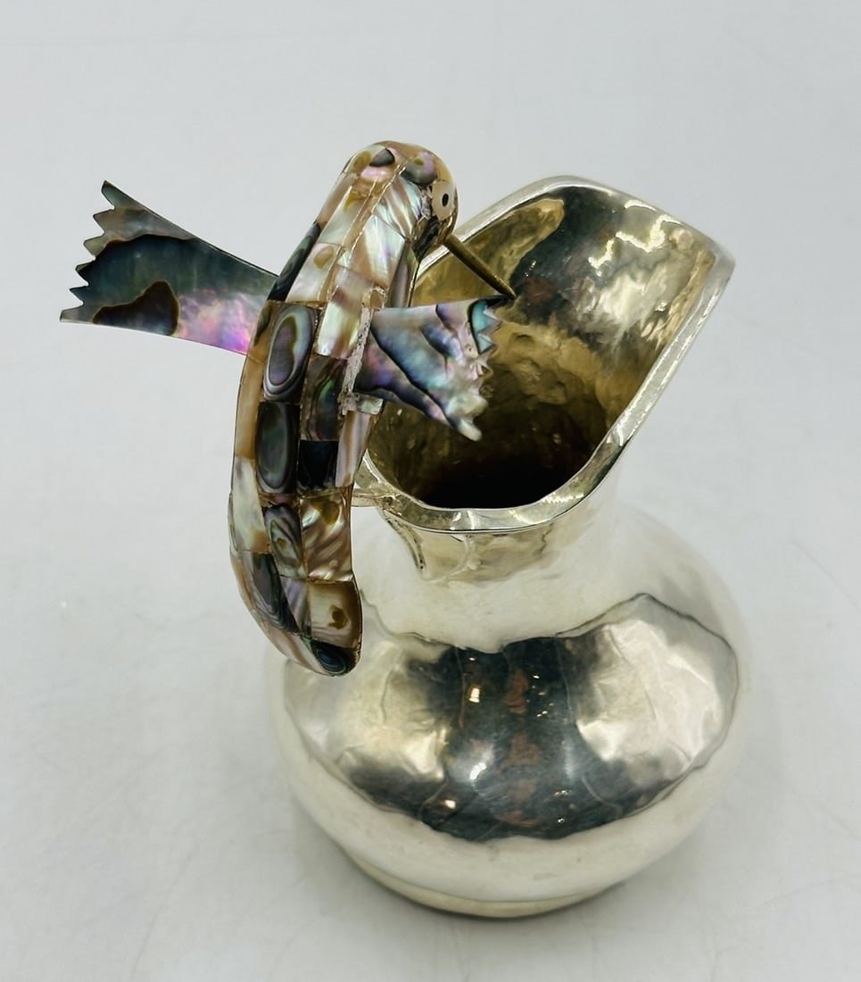 Artwork by Los Castillo, Los Castillo Hummingbird Pitcher With Abalone Shell Body, Mexico 20th Century, Made of Vintage Silver and