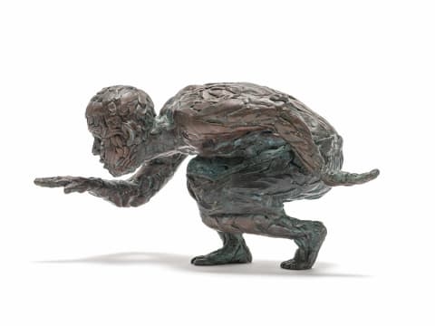 Artwork by Robert Rorich, Pangolin Boy, Made of bronze with a brown patina