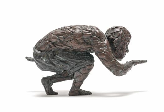 Artwork by Robert Rorich, Pangolin Boy, Made of bronze with a brown patina