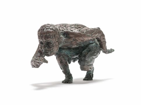 Artwork by Robert Rorich, Pangolin Boy, Made of bronze with a brown patina