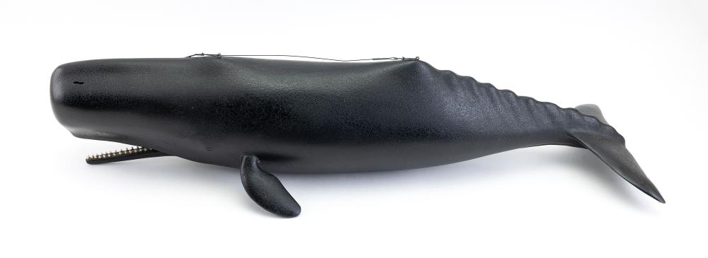 Artwork by Irving Briggs, IRVING BRIGGS CARVING OF A SPERM WHALE WITH TWO  SQUID, Made of RUBBER