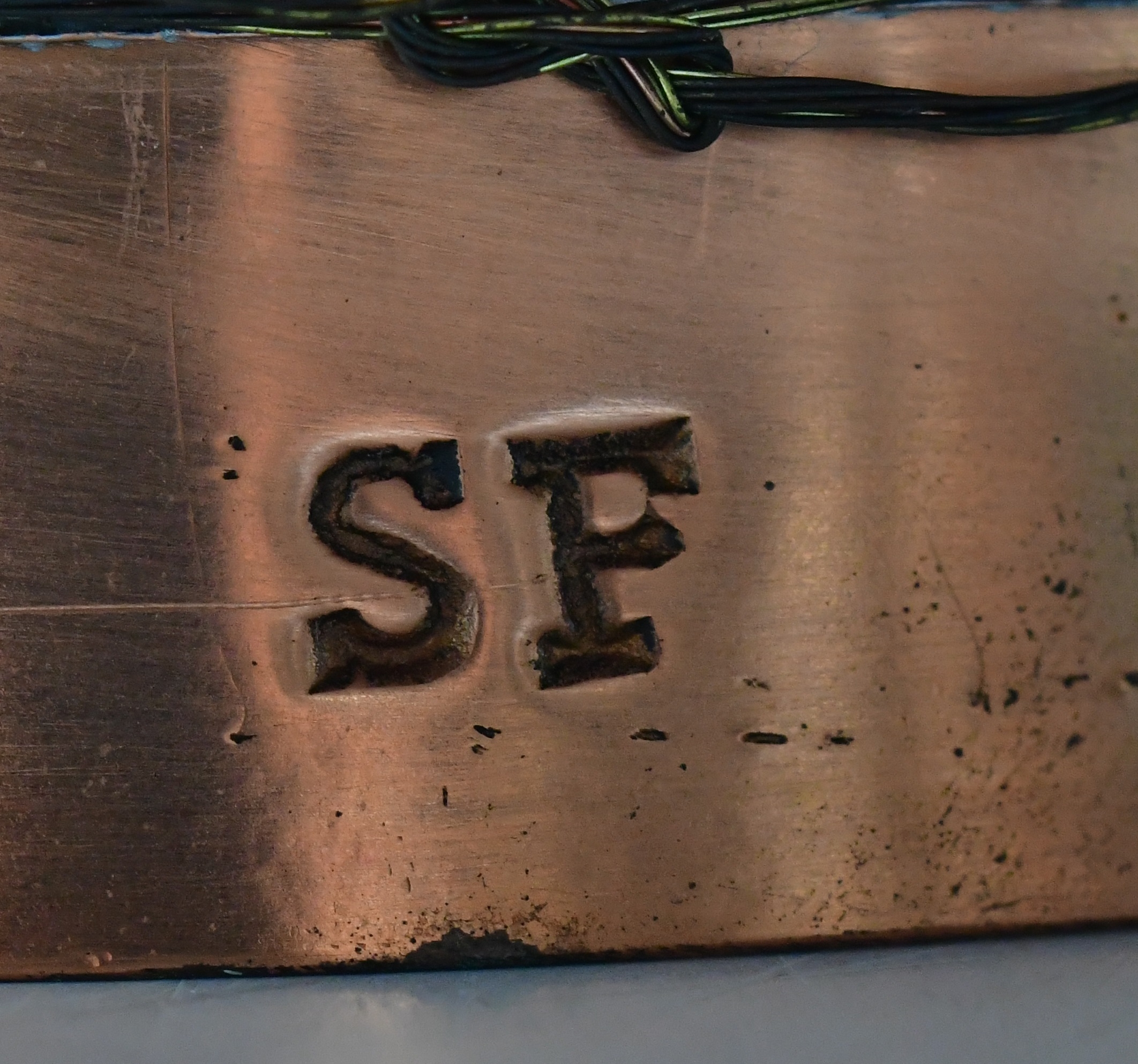 Artwork by Sam Fanaroff, SAM FANAROFF BEM (1926-2019); a circular copper and pewter bowl depicting a bird flying over water to the wide rim, Made of brass