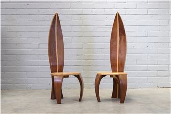 a pair of walnut and maple throne chairs each with an inlaid leaf-shaped back over an hexagonal-shaped seat and swept front supports - Andrew Varah
