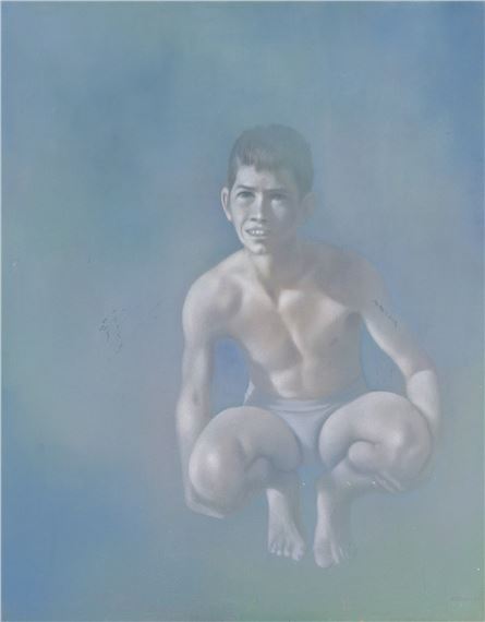 Boy Against a Blue Background