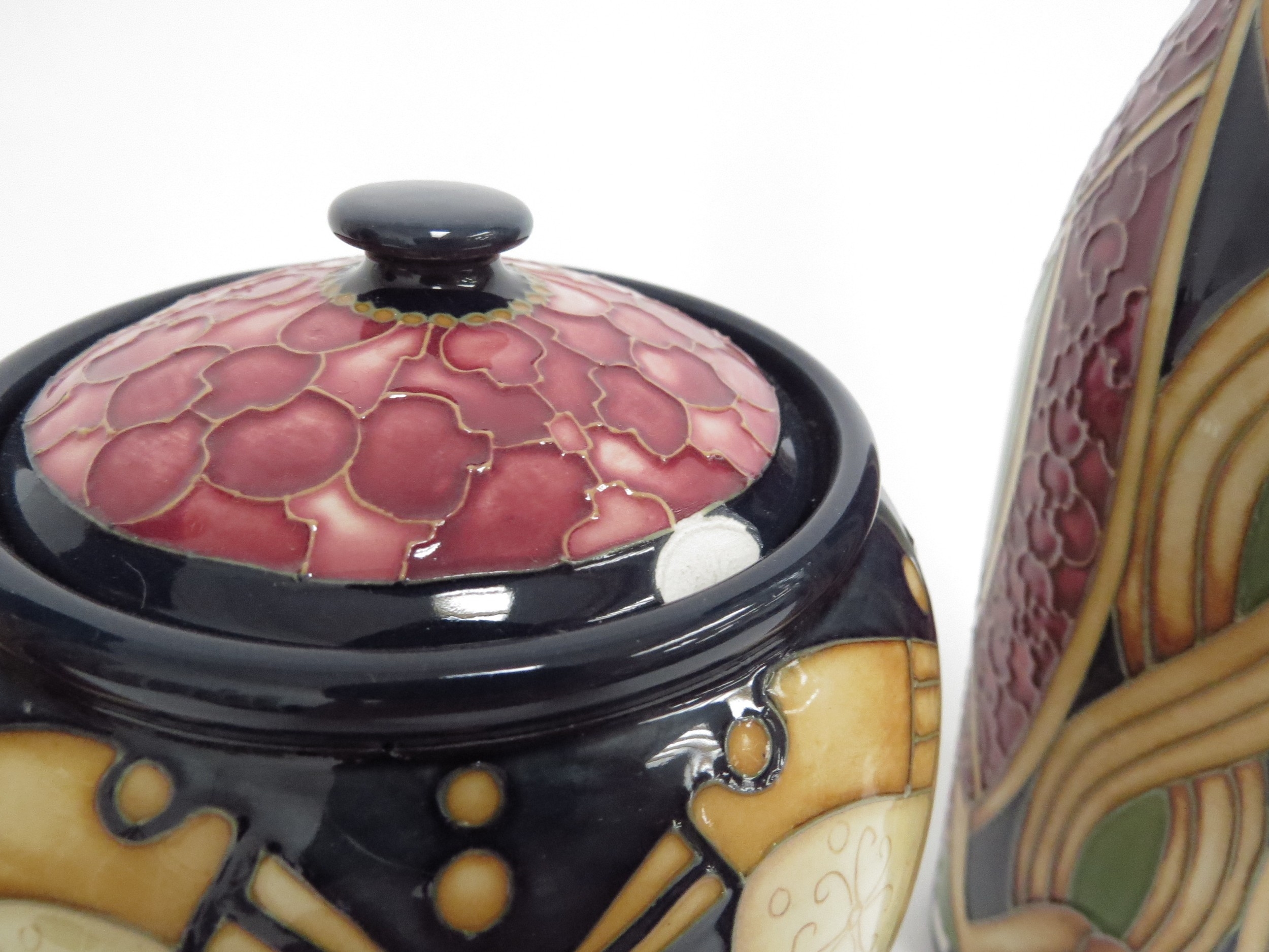 Artwork by Alicia Amison, Moorcroft Staffordshire Gold pattern pieces including lidded ginger jar  a slender ewer,cm tall and two vases