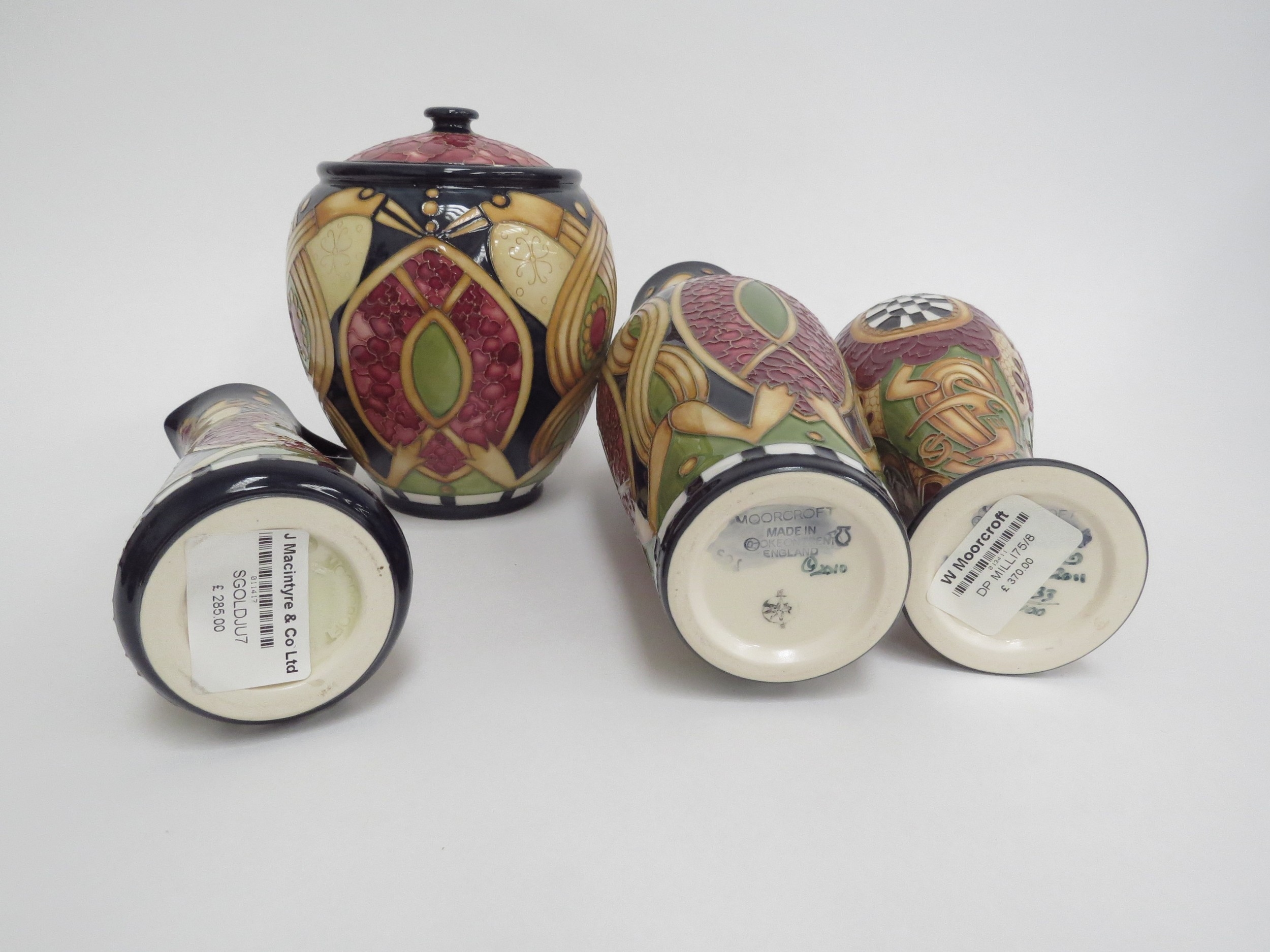 Artwork by Alicia Amison, Moorcroft Staffordshire Gold pattern pieces including lidded ginger jar  a slender ewer,cm tall and two vases