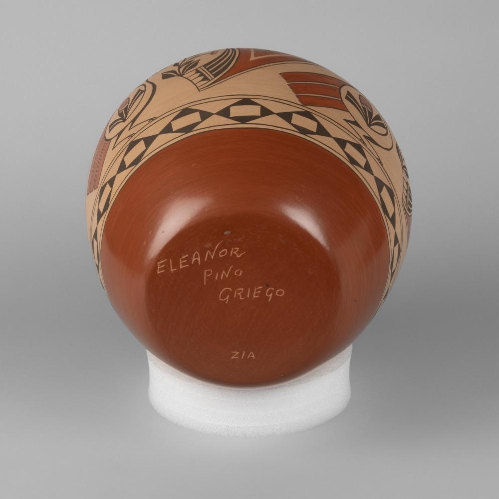 Artwork by Eleanor Pino Griego, Polychrome Redware Jar with Zia Bird, Made of redware jar