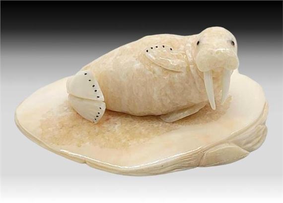 Brian Kulik | A portly walrus figurine resting on a slice of walrus ...