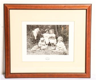 A framed Caroline Arbour decorative print featuring children dressed in white - Caroline Arbour