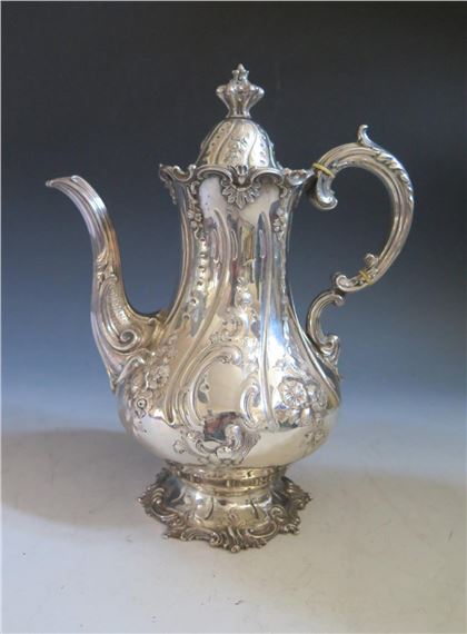 A Victorian Silver Coffee Pot with embossed foliate decorati by John Barnard, 1851