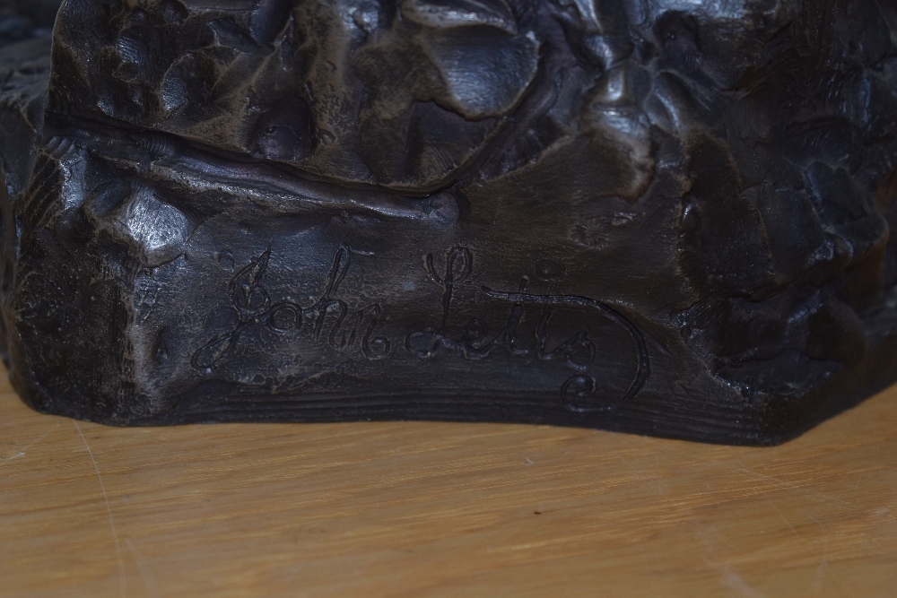 Artwork by John Letts, Seated lady, Made of resin sculpture