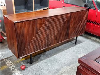 Star Lot : A very chic credenza by Kare Design boasting a very stylish ridged geometric pattern to its three cabinet doors, which open to reveal a single shelf to interior. From a fabulous Dublin penthouse. MM:  x  x  cm RRP - Kare Design