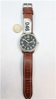 A Louis Pion  wristwatch with  strap. Water resistant tom. Watch has luminous dial, with second hand and datejust. Watch in working order - Louis Pion