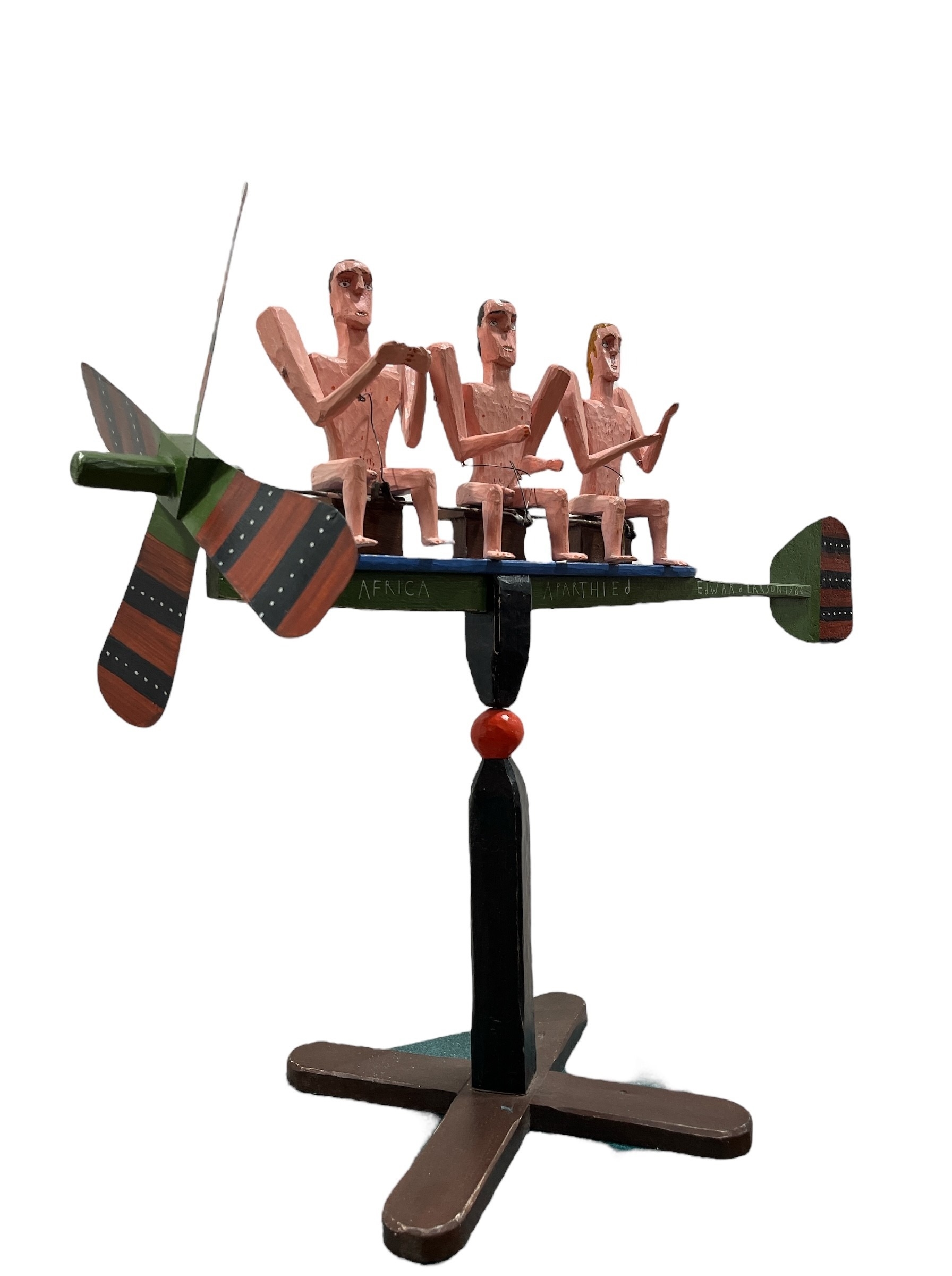 Ed Larson | ED LARSON Apartheid Folk Art Whirligig (1986) | MutualArt