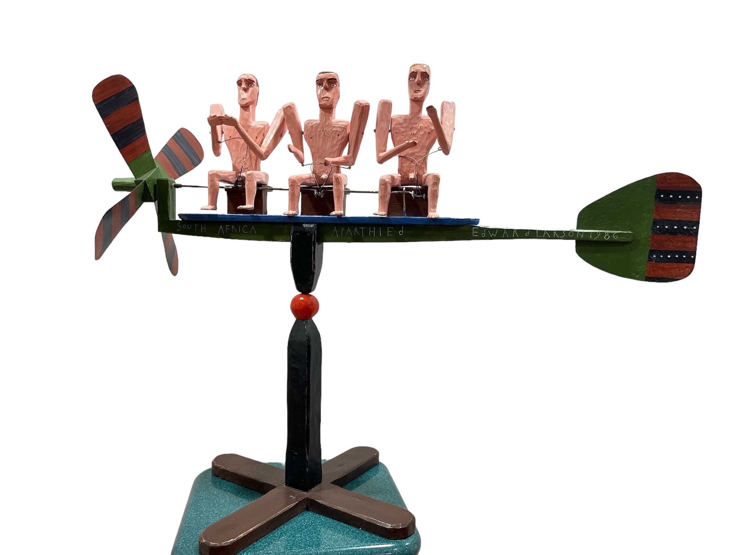 Ed Larson | ED LARSON Apartheid Folk Art Whirligig (1986) | MutualArt