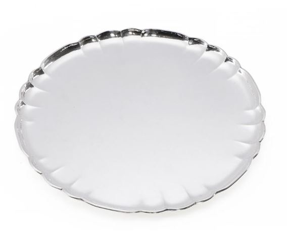 A large, circular serving tray with hammered surface and curvy rim - Oscar Gundlach Pedersen