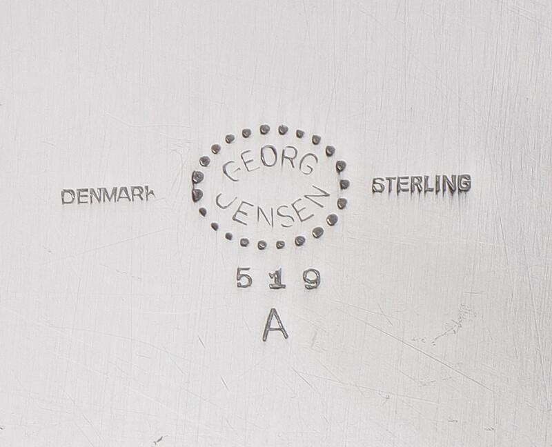 Artwork by Oscar Gundlach Pedersen, A large, circular serving tray with hammered surface and curvy rim