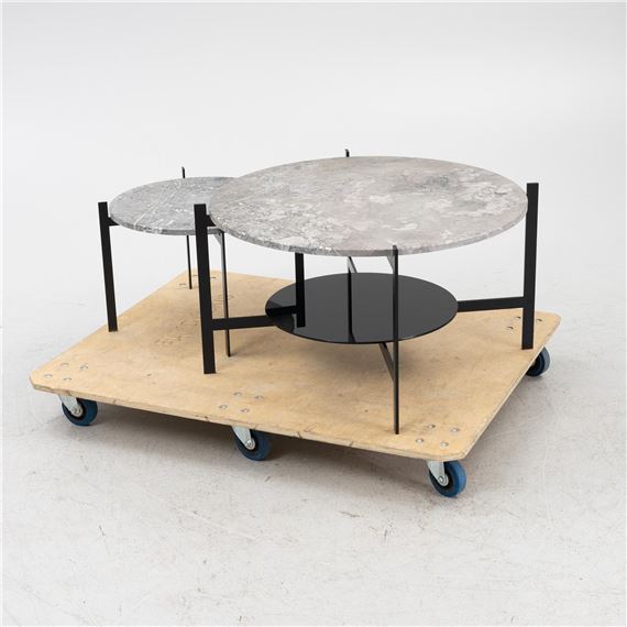 2 coffee tables with frames in powder-coated steel and removable tabletops in grey marble. Labelled. Coffee table with magazine shelf - Dennis Marquart
